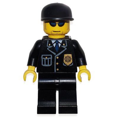 Minifigura Policeman, Black Suit with Badge, Black Cap, Sunglasses del set 7723