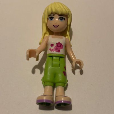 Minifigure Stephanie - White Top, Lime Trousers del set 3185