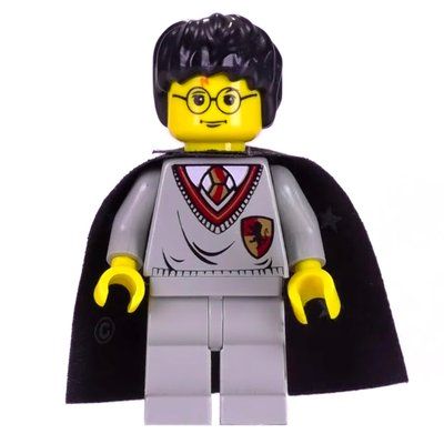 Minifigure Harry Potter, Yellow Skin, Gryffindor Sweater with Crest, Cape with Stars del set 4729