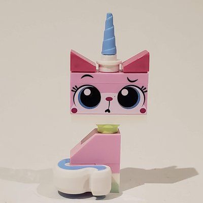 Figurine Unikitty, Sitting, Confused du set 70818