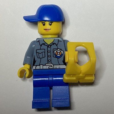 Figurine Coast Guard, Woman, Sand Blue Shirt with Badge, Blue Cap, Yellow Life Vest du set 60167