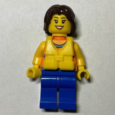 Minifigure Woman, Orange Halter Top with Flowers, Blue Legs, Yellow Life Vest, Dark Brown Hair del set 60014