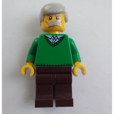 Minifigura Man, Green V-Neck Sweater, Dark Brown Legs, Moustache del set 10229