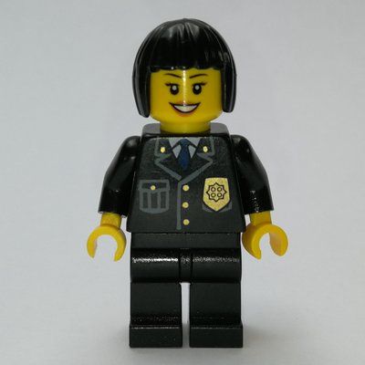 Minifigurka Policewoman, Black Suit with Badge, Black Hair z zestawu 7498