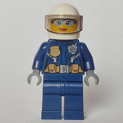 Minifigurka Policewoman, Dark Blue Jacket with Radio, Badge, and Belt with Pouches, White Helmet with Visor, Light Blue Sunglasses z zestawu 60140