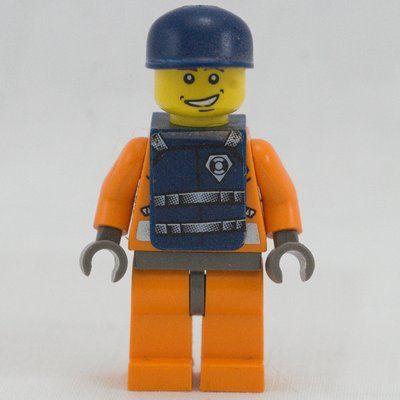 Minifigurka Coast Guard, Orange Jumpsuit with Zipper, Radio, and Badge, Dark Blue Cap, Dark Blue Vest z zestawu 7047