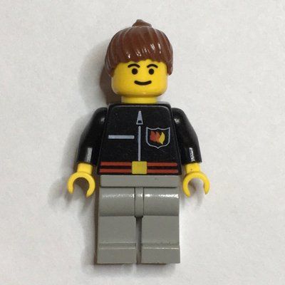 Minifigure Firewoman, Black Fire Jacket with Red Belt and Badge, Brown Hair from set 9293