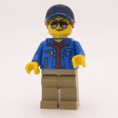 Minifigur Woman, Blue Jacket, Dark Tan Legs, Dark Blue Cap with Ponytail aus Set 60289